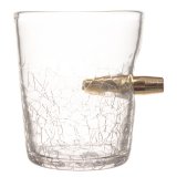 Glas med genomborrad kula